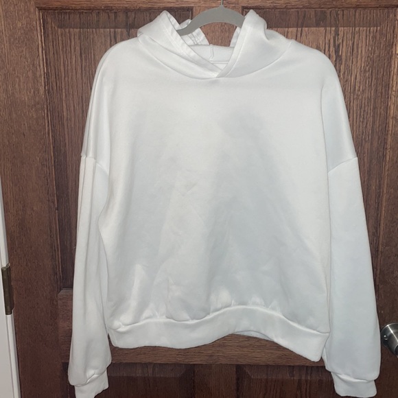 White unisex hoodie with a logo on the back. Size Medium - Picture 3 of 4